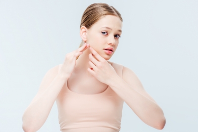 Acne Attention: Motivating Teenagers to Commit to Treatment Regimens