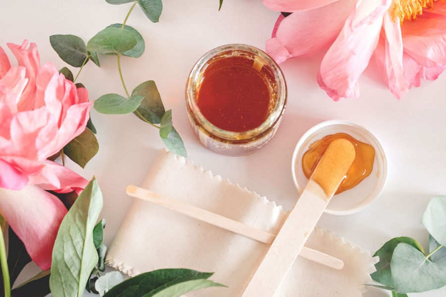 Smooth Moves: Is Waxing or Sugaring Better for Your Spa?