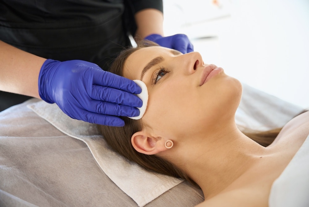 image of a face being wiped aftear a cleansing